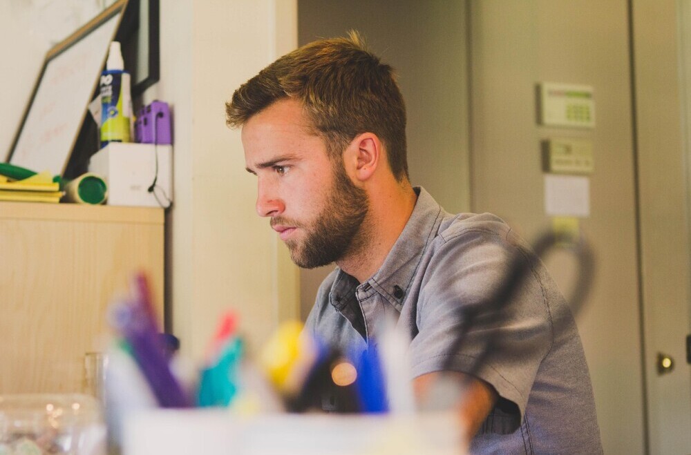 man working on computer