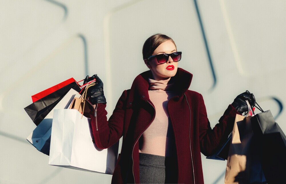 woman with lots of shopping bags