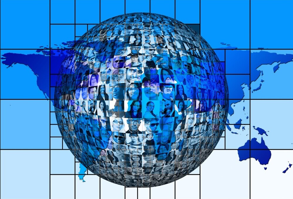 A world showing small imags of different people in different countries to represent global online business